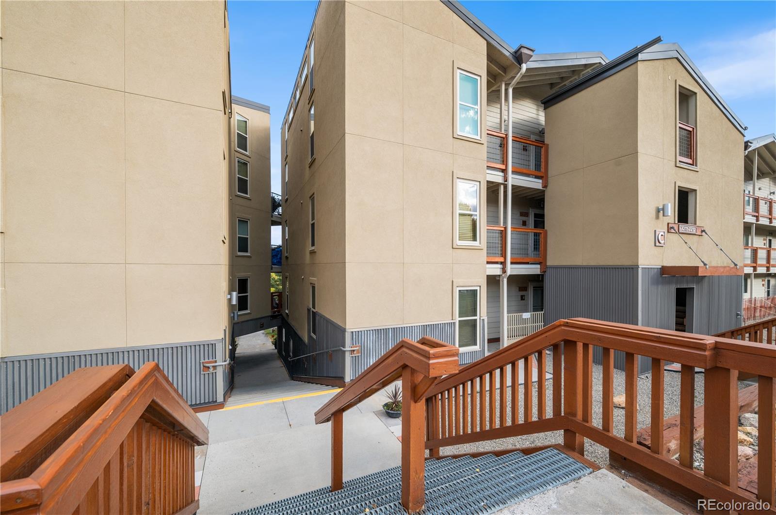 7222 Ryan Gulch Road, Unit 202 Silverthorne, CO 80498 - Photo 26 of 36 a view of a house with many windows