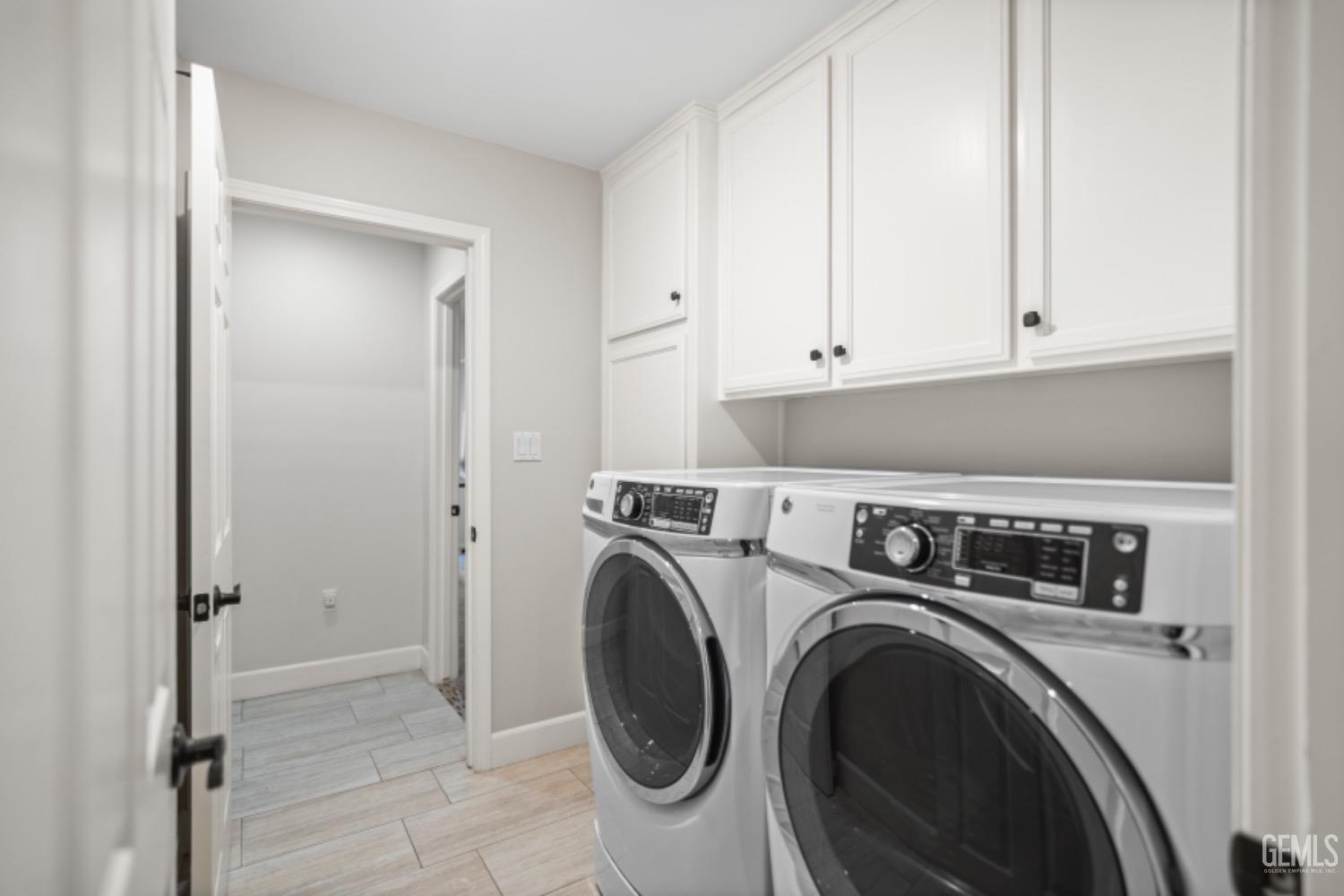 Undisclosed Address Bakersfield, CA 93308 - Photo 28 of 37 a utility room with dryer and washer