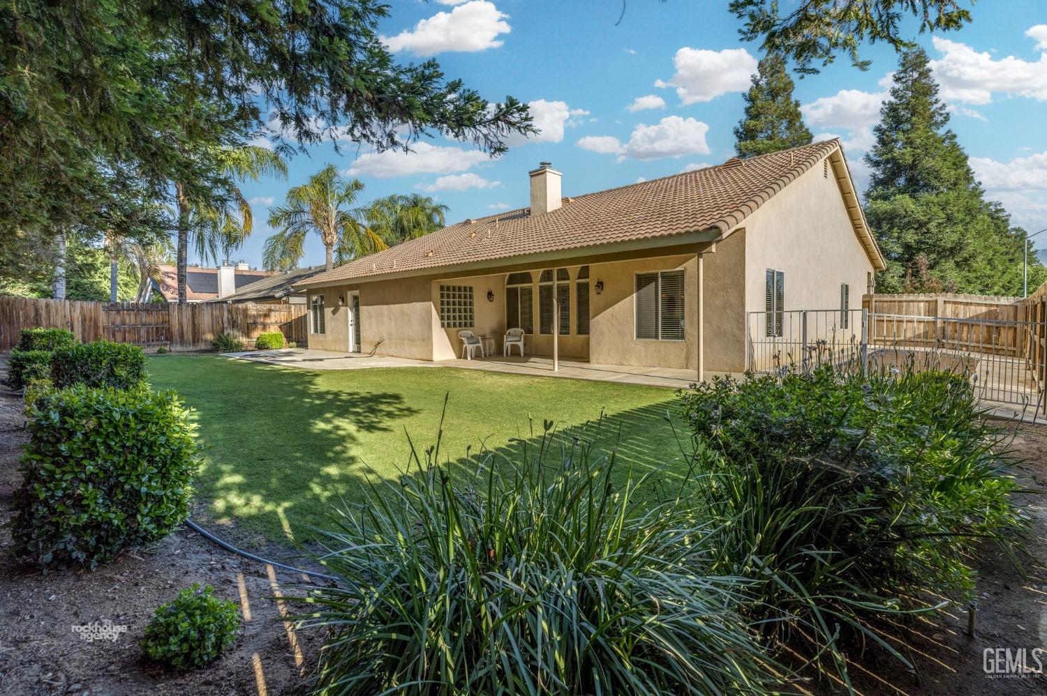 Undisclosed Address Bakersfield, CA 93308 - Photo 34 of 37 a house view with a garden space