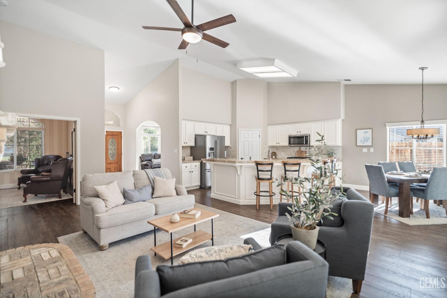 Undisclosed Address Bakersfield, CA 93308 - Photo 9 of 37 a living room with furniture and a large window
