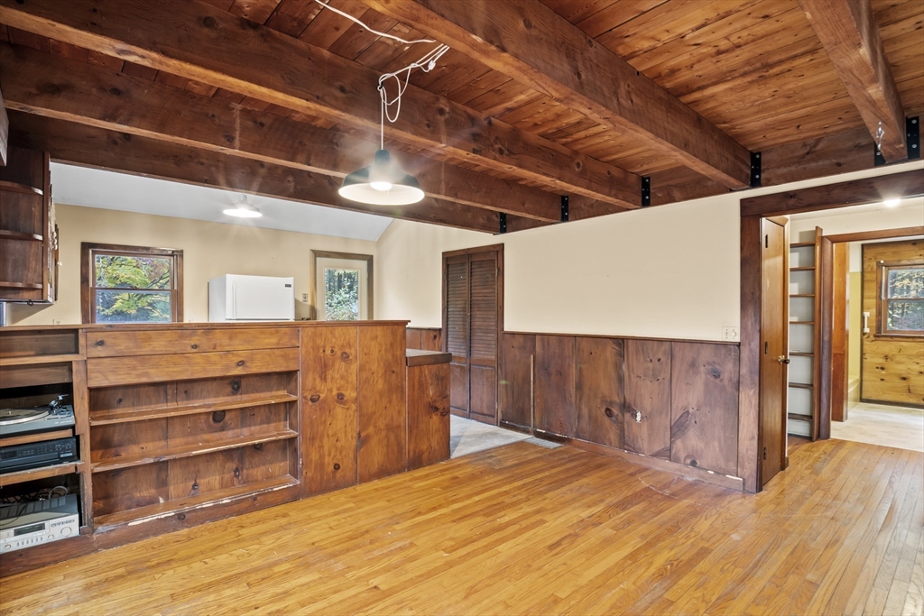 55 Putney Road Leverett, MA 01054 - Photo 11 of 40 a view of a room with wooden floor and windows