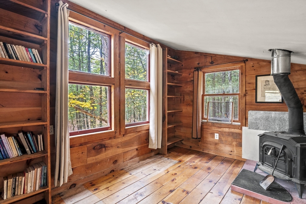 55 Putney Road Leverett, MA 01054 - Photo 15 of 40 a view of a livingroom with furniture and a window