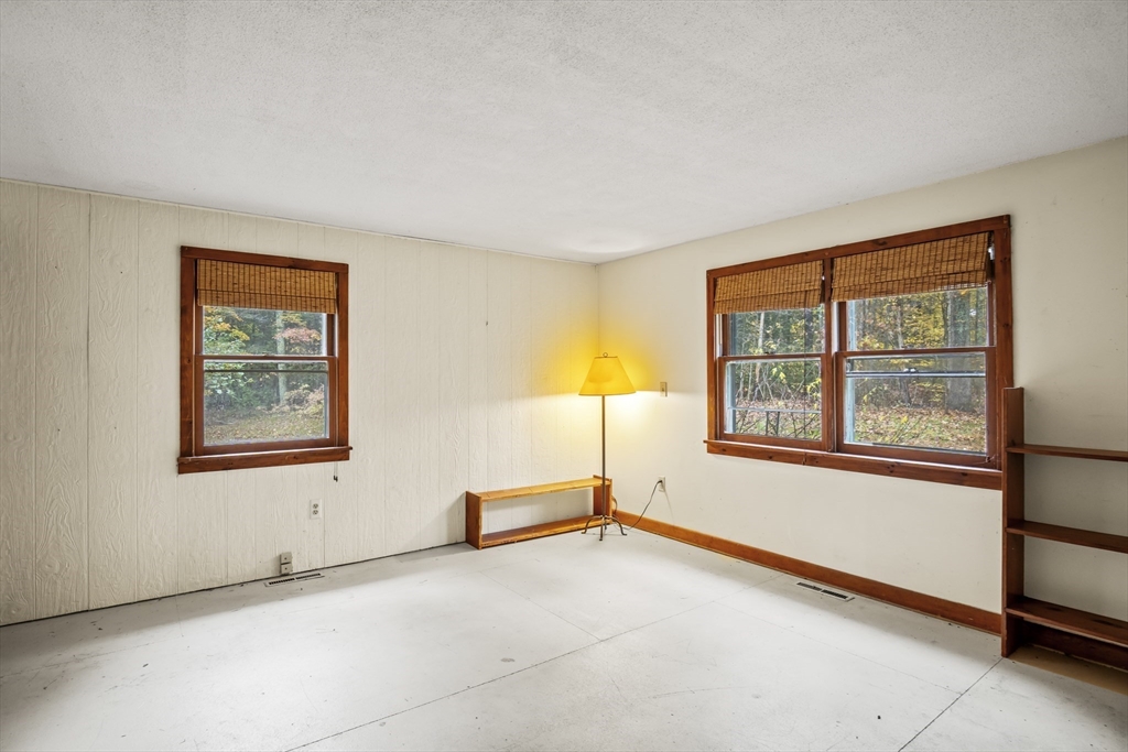 55 Putney Road Leverett, MA 01054 - Photo 16 of 40 an empty room with a window