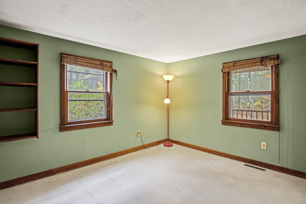 55 Putney Road Leverett, MA 01054 - Photo 19 of 40 a view of a room with a window and a ceiling fan