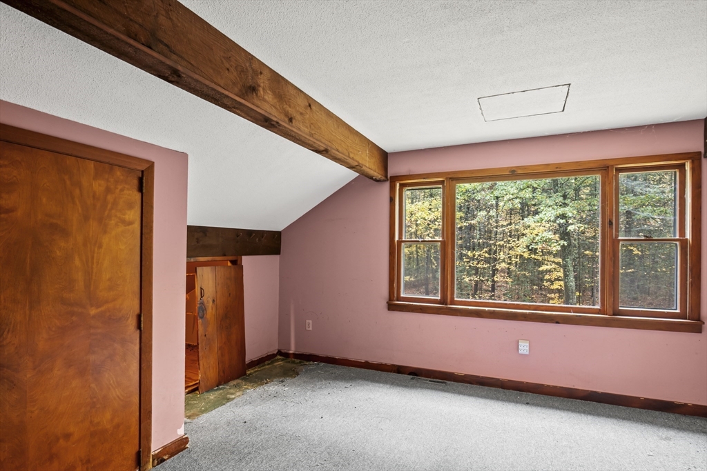55 Putney Road Leverett, MA 01054 - Photo 21 of 40 a view of an empty room with a window