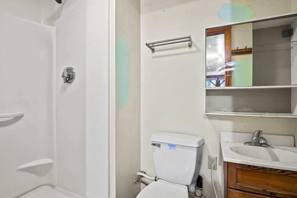 55 Putney Road Leverett, MA 01054 - Photo 24 of 40 a bathroom with a toilet and a sink