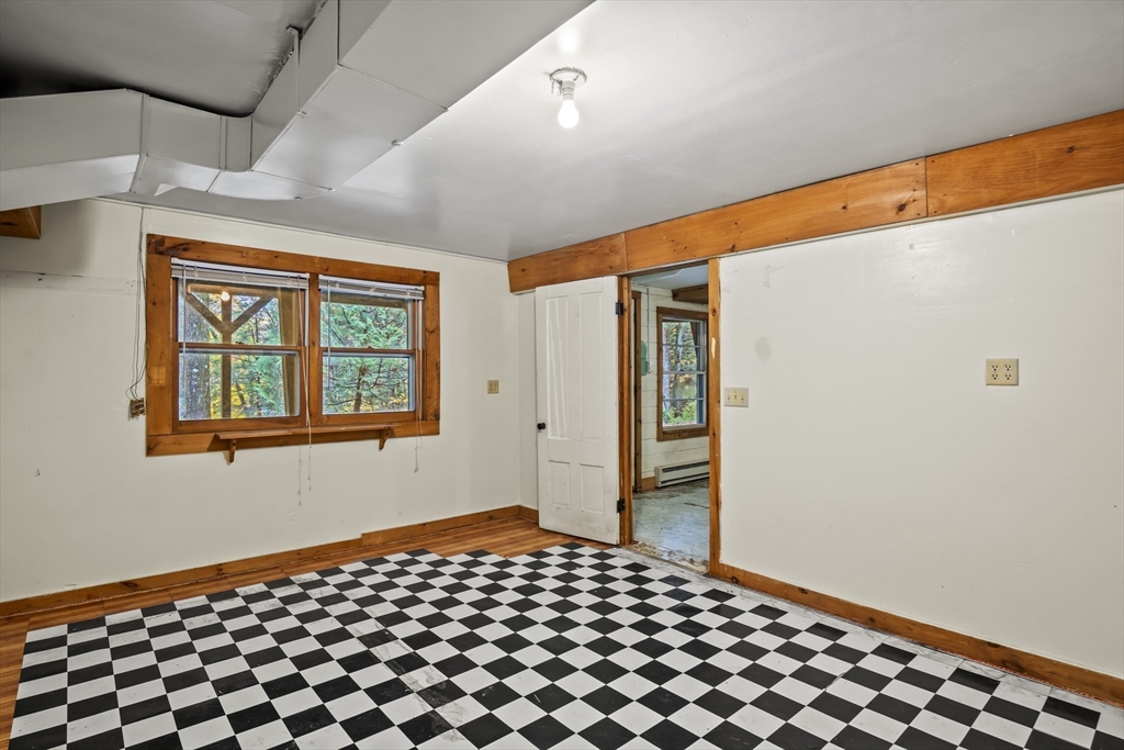 55 Putney Road Leverett, MA 01054 - Photo 30 of 40 a bedroom with a bed and a window