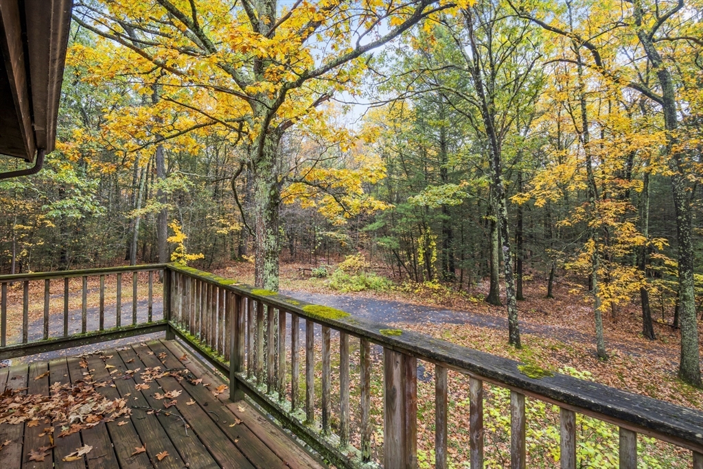55 Putney Road Leverett, MA 01054 - Photo 32 of 40 a view of a balcony with trees