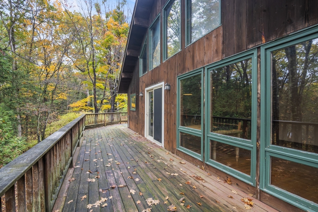 55 Putney Road Leverett, MA 01054 - Photo 33 of 40 a view of a house with a balcony