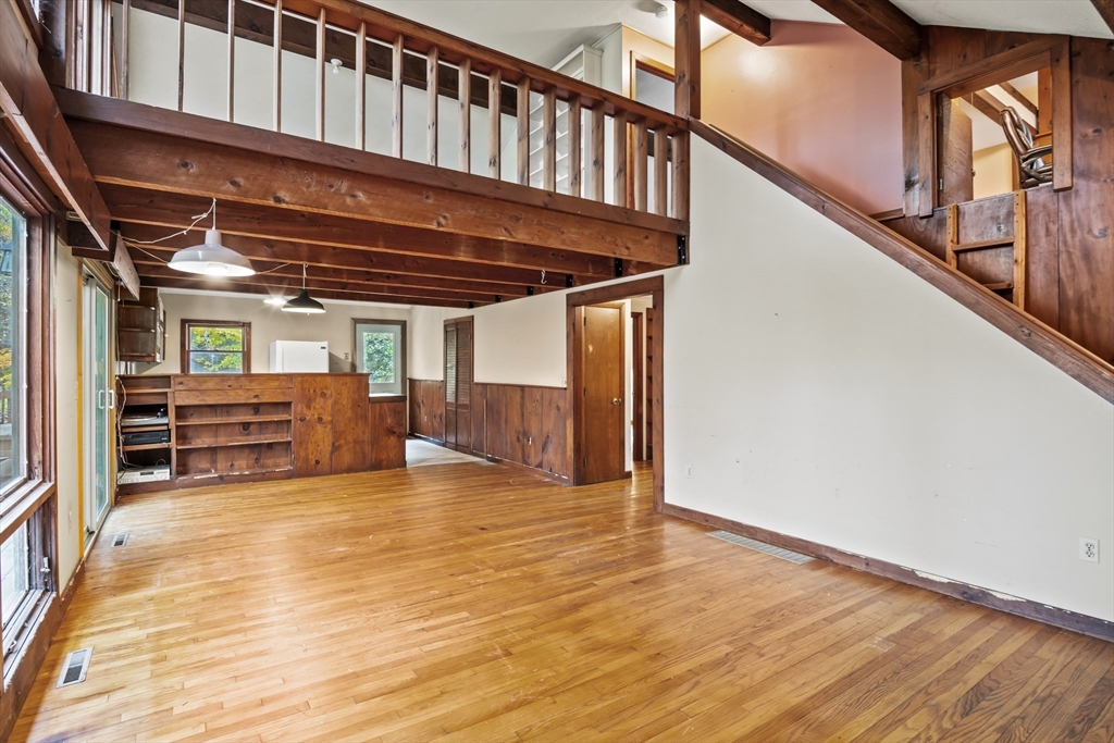 55 Putney Road Leverett, MA 01054 - Photo 4 of 40 a view of an empty room with stairs