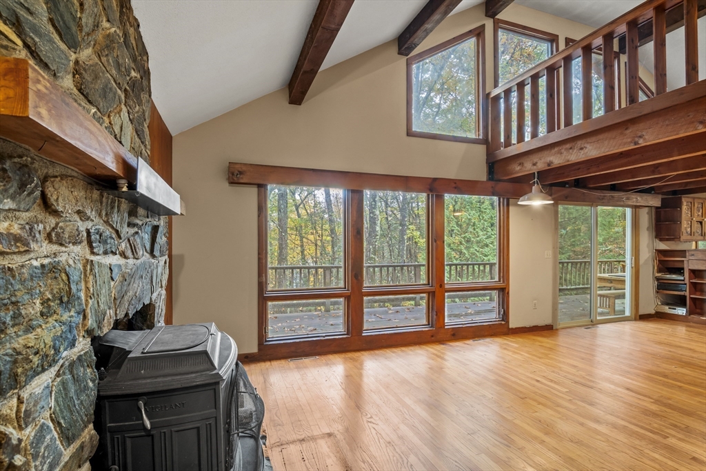 55 Putney Road Leverett, MA 01054 - Photo 7 of 40 a view of a livingroom with furniture and staircase