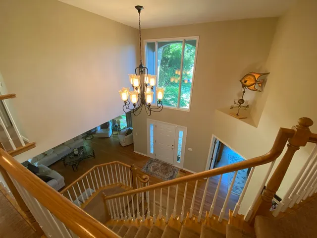 a view of a balcony with furniture