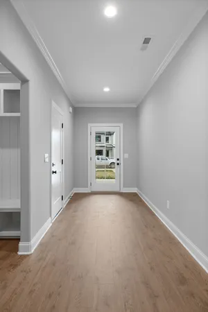 a view of an empty room with a window