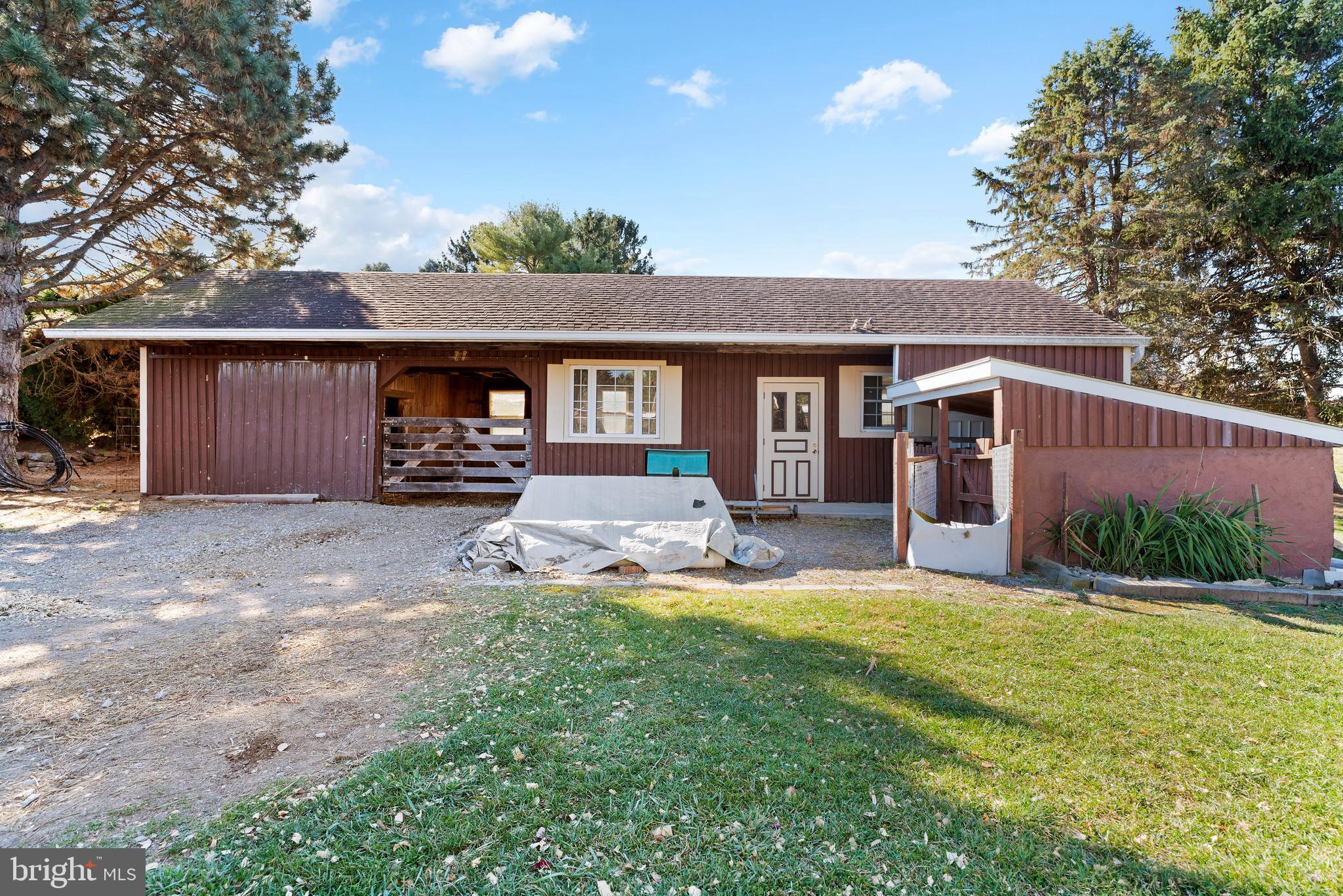 5783 Buttermilk Road Waynesboro, PA 17268 - Photo 56 of 68 2 stalls w/ sep swine stall / feed & tack room