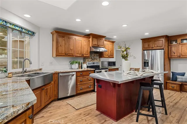 a bedroom with bed and window