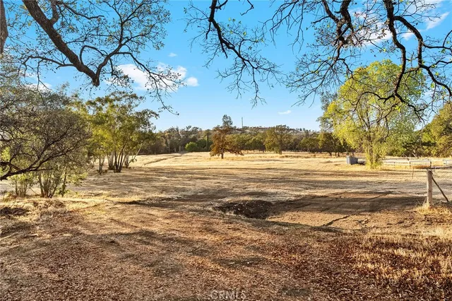 a view of swimming pool with outdoor seating