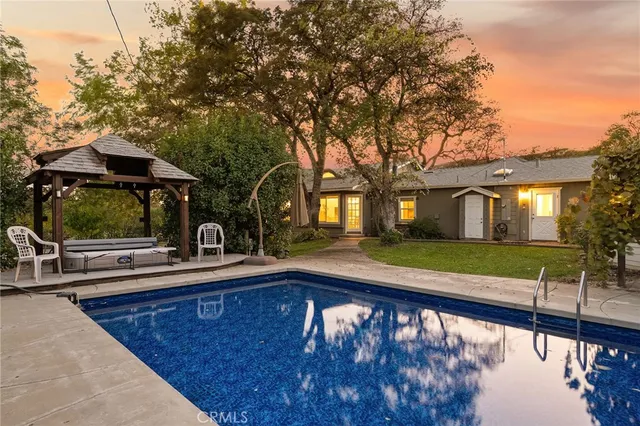 an aerial view of residential building with parking space