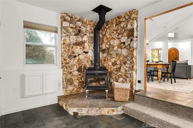 a kitchen with stainless steel appliances granite countertop wooden cabinets a sink and a stove