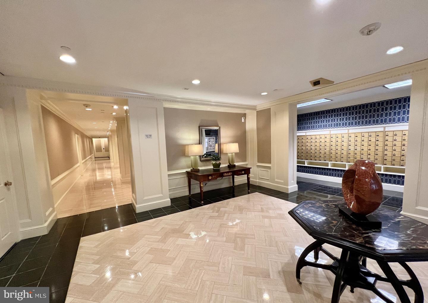 10 East Lee Street, Unit 2405 Baltimore, MD 21202 - Photo 35 of 50 a living room with furniture and a window