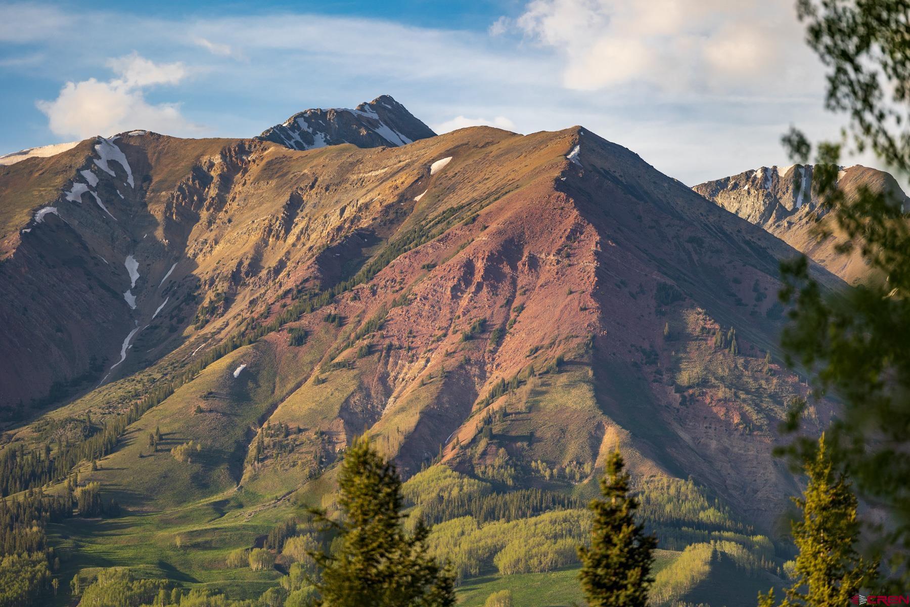 E31 Prospect Drive Crested Butte, CO 81225 - Photo 18 of 26 a view of a house with a yard