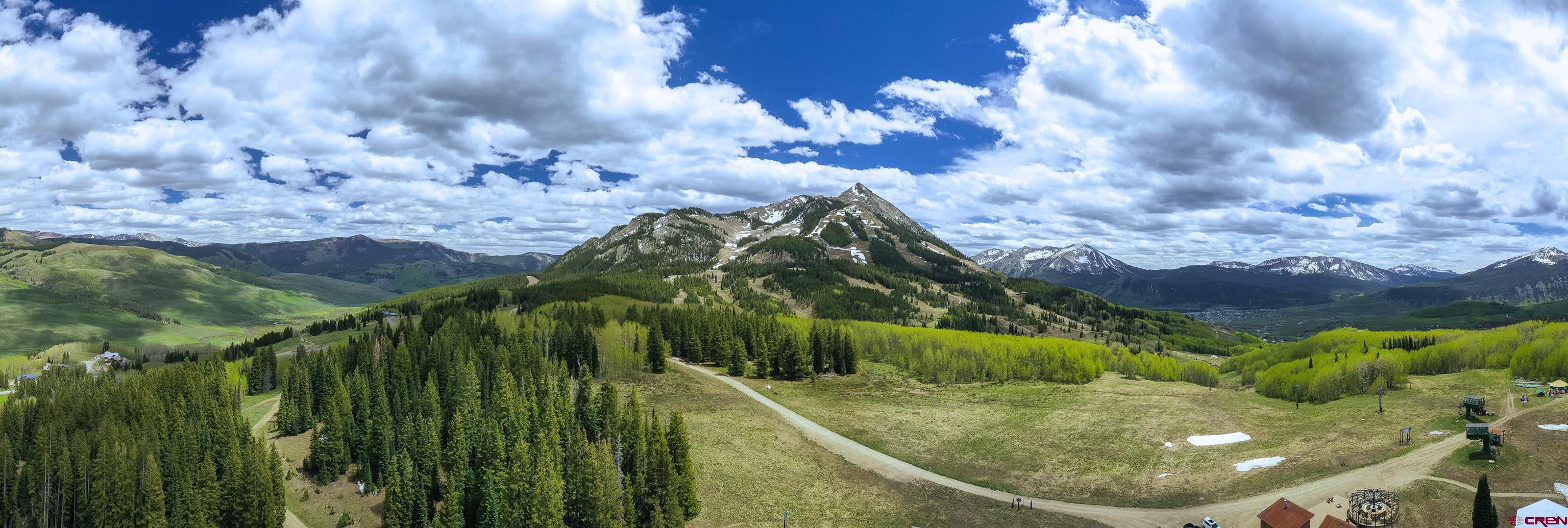 E31 Prospect Drive Crested Butte, CO 81225 - Photo 23 of 26 a view of a swimming pool with a yard