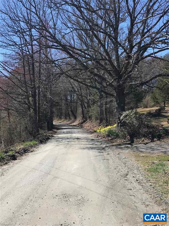 5428 Sugar Ridge Road Crozet, VA 22932 - Photo 5 of 19 a view of a yard with a tree