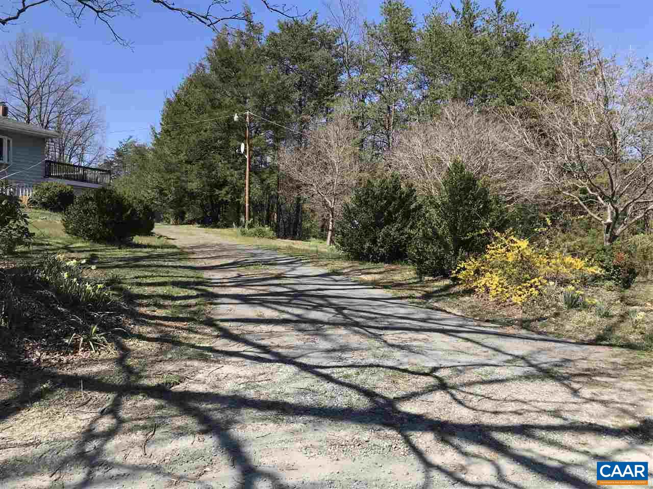 5428 Sugar Ridge Road Crozet, VA 22932 - Photo 9 of 19 a view of a yard and trees in the background
