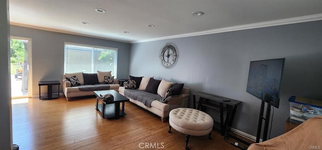 15980 Filbert Street Sylmar, CA 91342 - Photo 3 of 17 a living room with furniture and a large window
