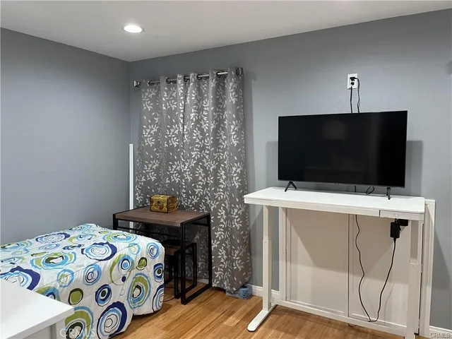 a bathroom with a toilet sink and shower