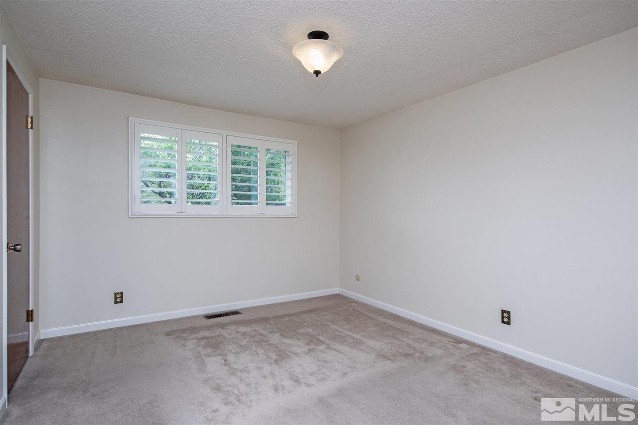4095 Warren Way Reno, NV 89509 - Photo 14 of 17 an empty room with a window