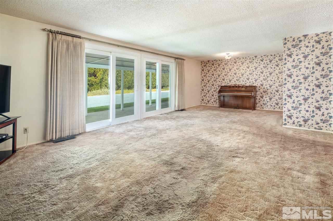 4095 Warren Way Reno, NV 89509 - Photo 9 of 17 an empty room with windows