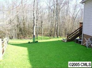 9102 Laurel Ridge Trail Charlotte, NC 28269 - Photo 2 of 8 a view of a park with large trees