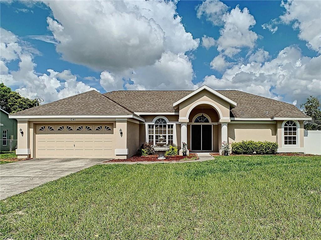 1041 Stratton Avenue Spring Hill, FL 34609 - Photo 1 of 1 1041 STRATTON AVE, SPRING HILL, FL 34609 Big Front Yard