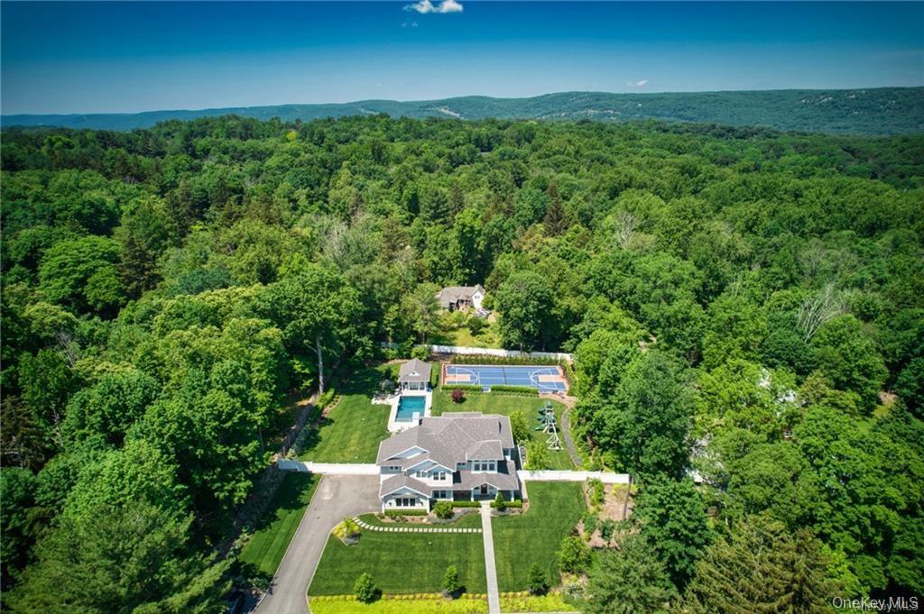 98 Mongaup Road Monticello, NY 12701 - Photo 2 of 2 an aerial view of a house with yard