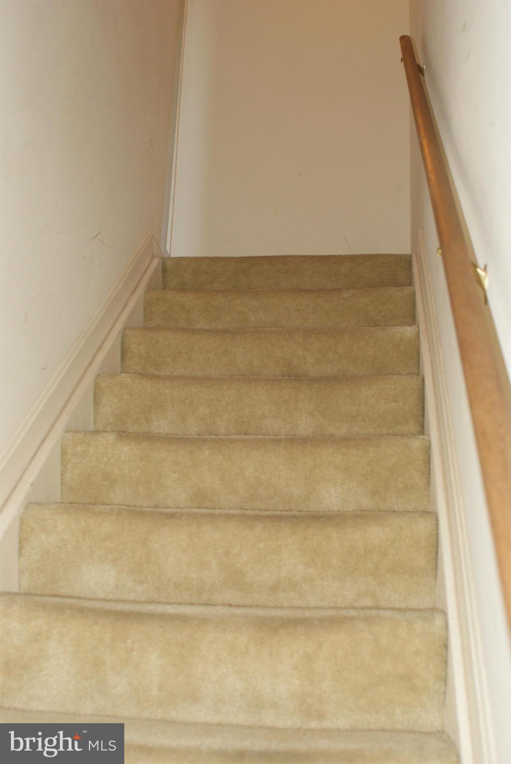 8526 General Way Manassas Park, VA 20111 - Photo 8 of 23 Stairs to upper level