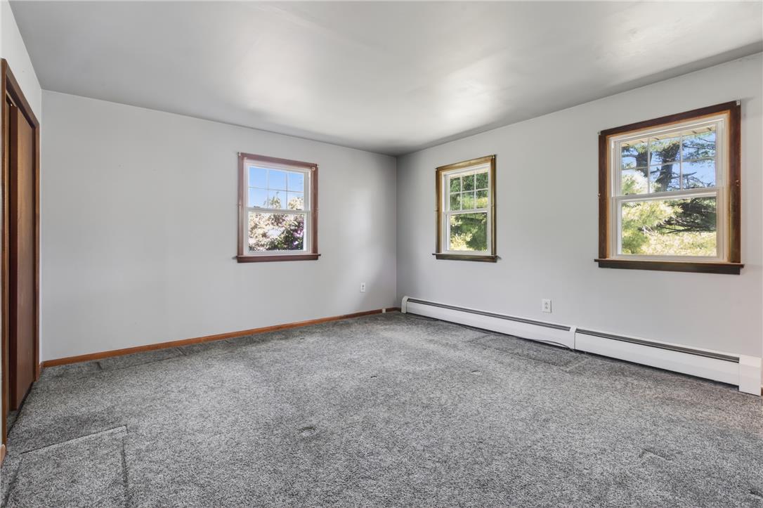 62 Stoney Road Tamaqua, PA 18252 - Photo 37 of 61 A well-lit room offering plush carpeted floors and verdant views from multiple windows.