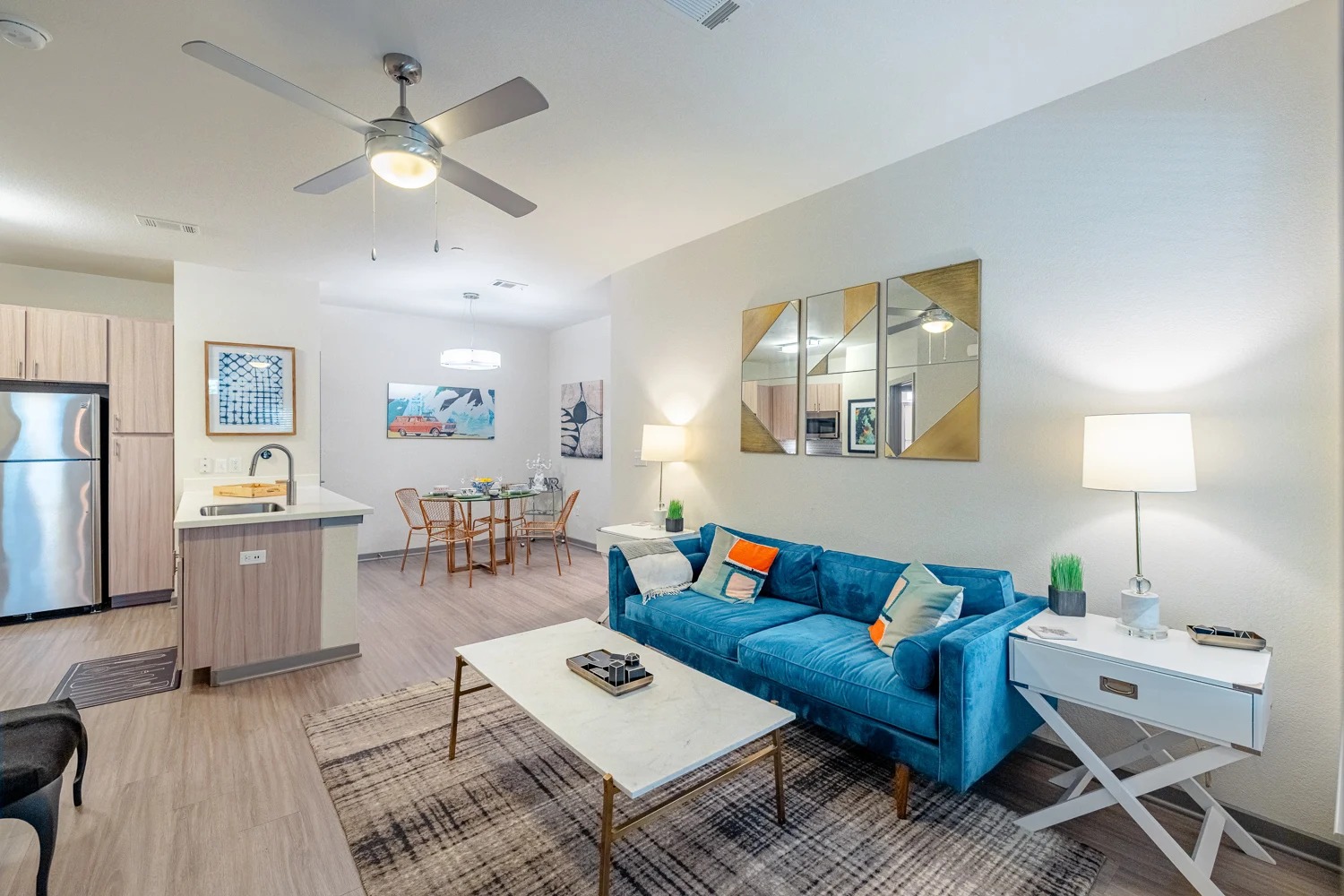 8515 Interstate 35, Unit 9106 Austin, TX 78744 - Photo 17 of 24 a living room with furniture and a chandelier