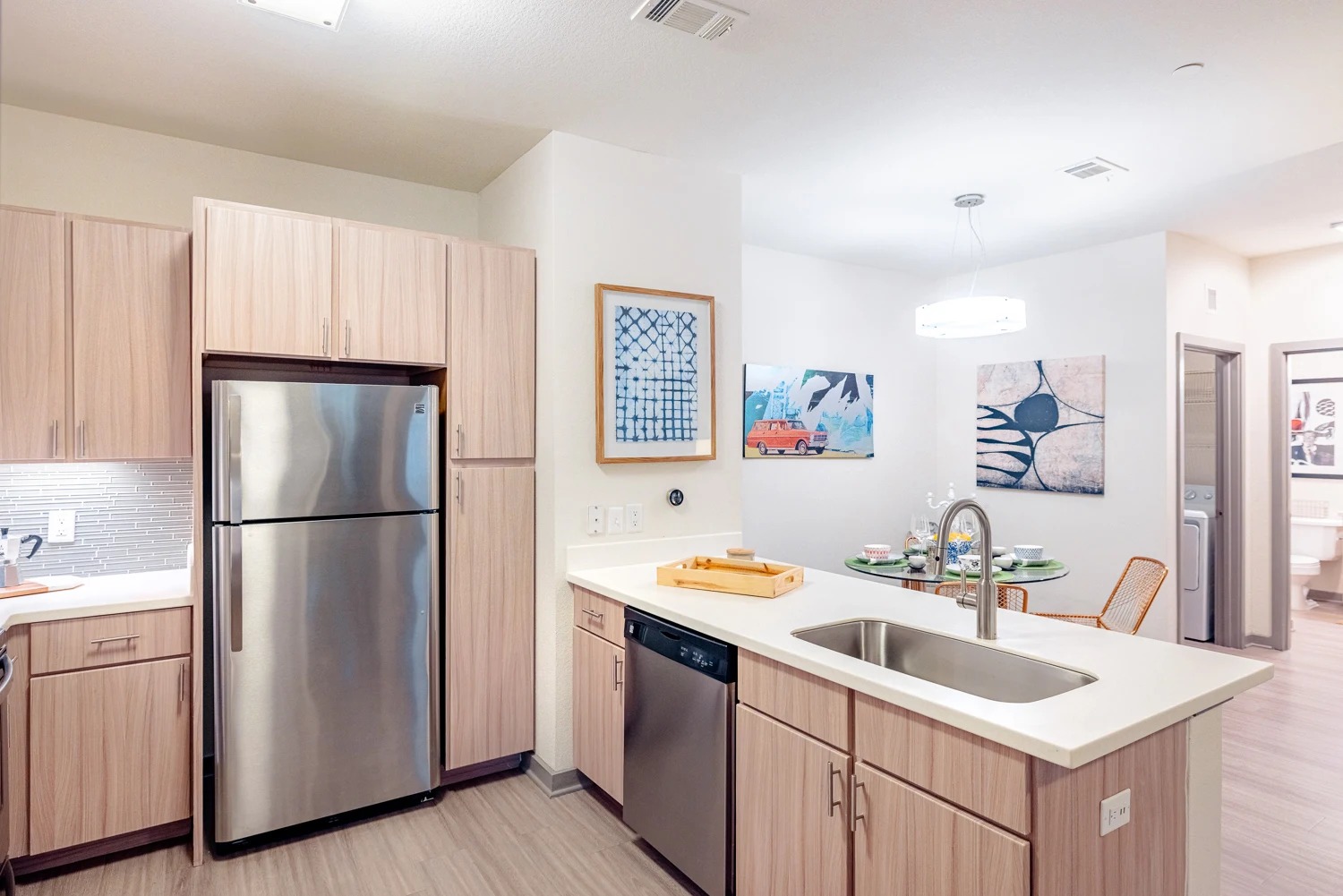 8515 Interstate 35, Unit 9106 Austin, TX 78744 - Photo 10 of 24 a kitchen with a sink cabinets and refrigerator