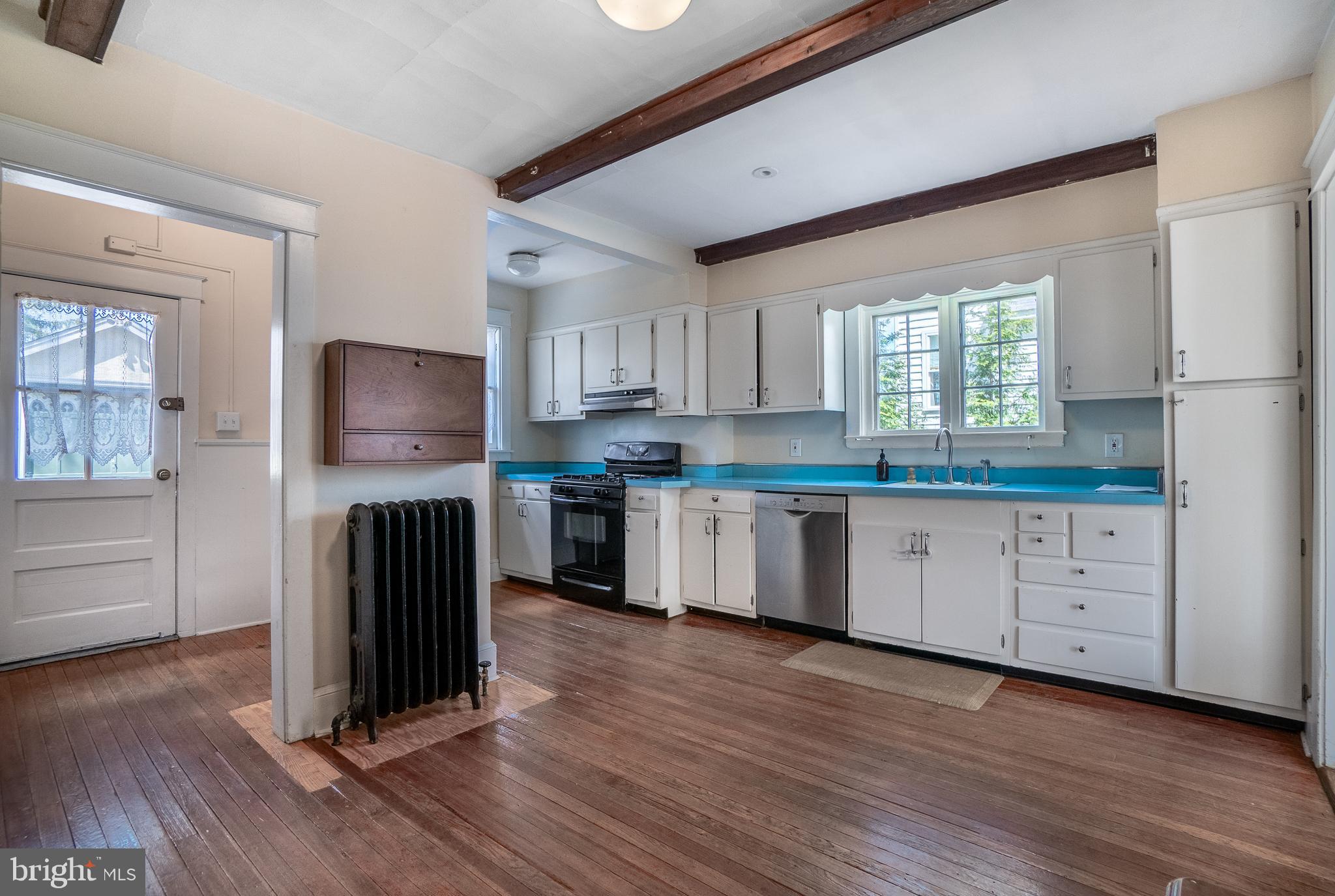 684 North Chester Road Swarthmore, PA 19081 - Photo 11 of 21 a kitchen with granite countertop a sink cabinets and wooden floor