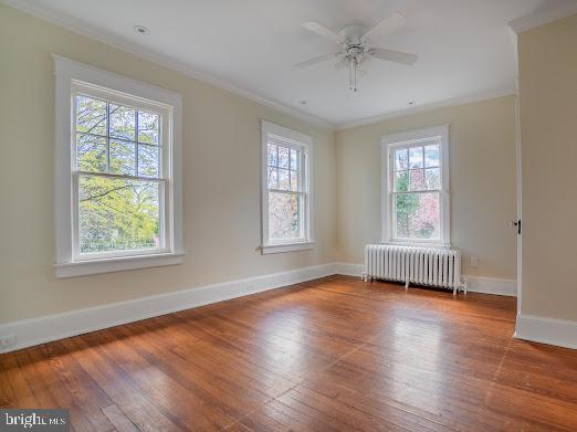 684 North Chester Road Swarthmore, PA 19081 - Photo 12 of 21 a view of an empty room with wooden floor and a window