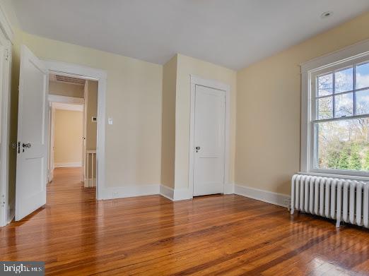 684 North Chester Road Swarthmore, PA 19081 - Photo 16 of 21 a view of empty room with wooden floor and fan