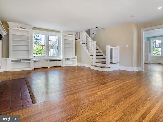 684 North Chester Road Swarthmore, PA 19081 - Photo 4 of 21 wooden floor in an empty room with a window and wooden floor