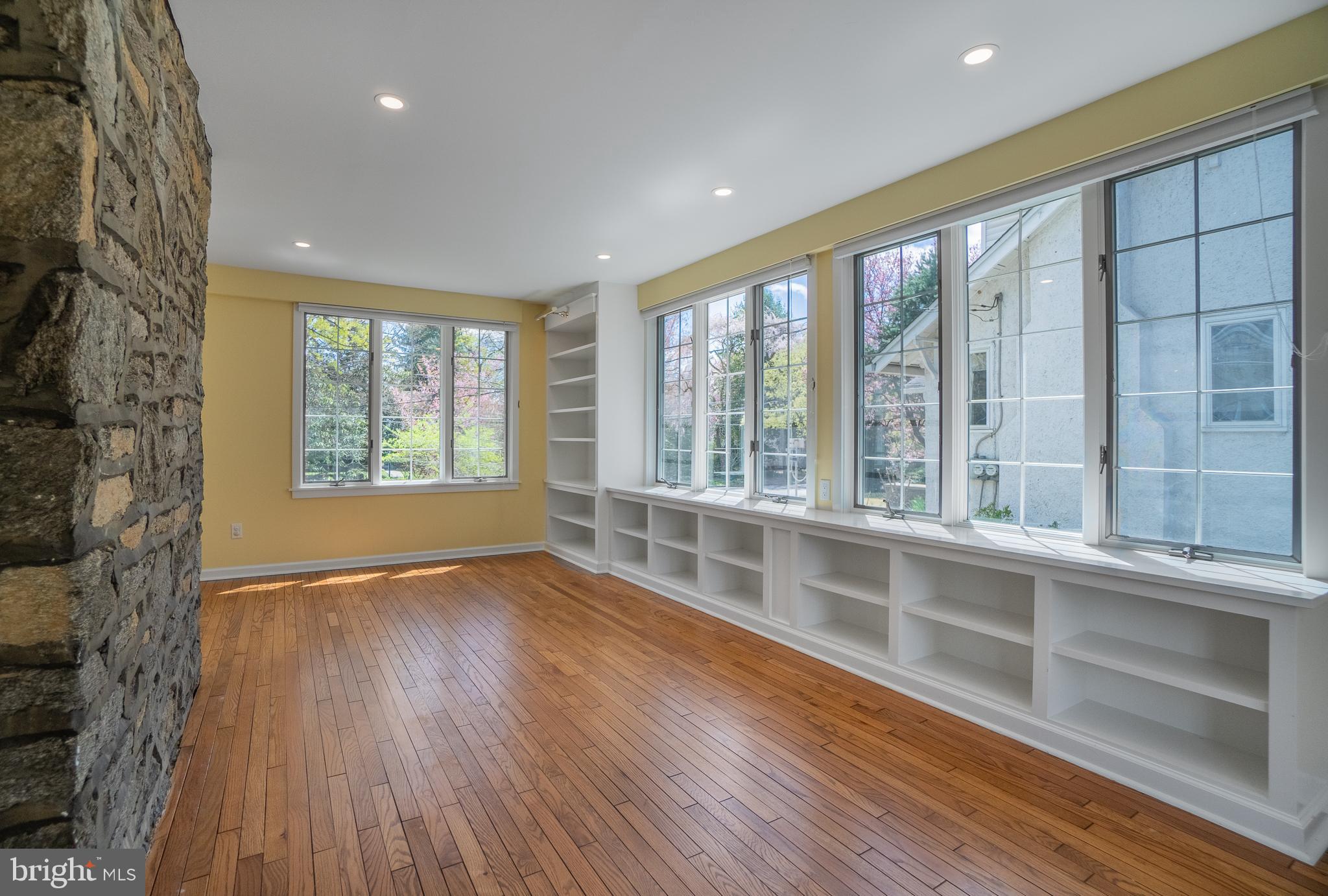 684 North Chester Road Swarthmore, PA 19081 - Photo 8 of 21 an empty room with wooden floor and windows