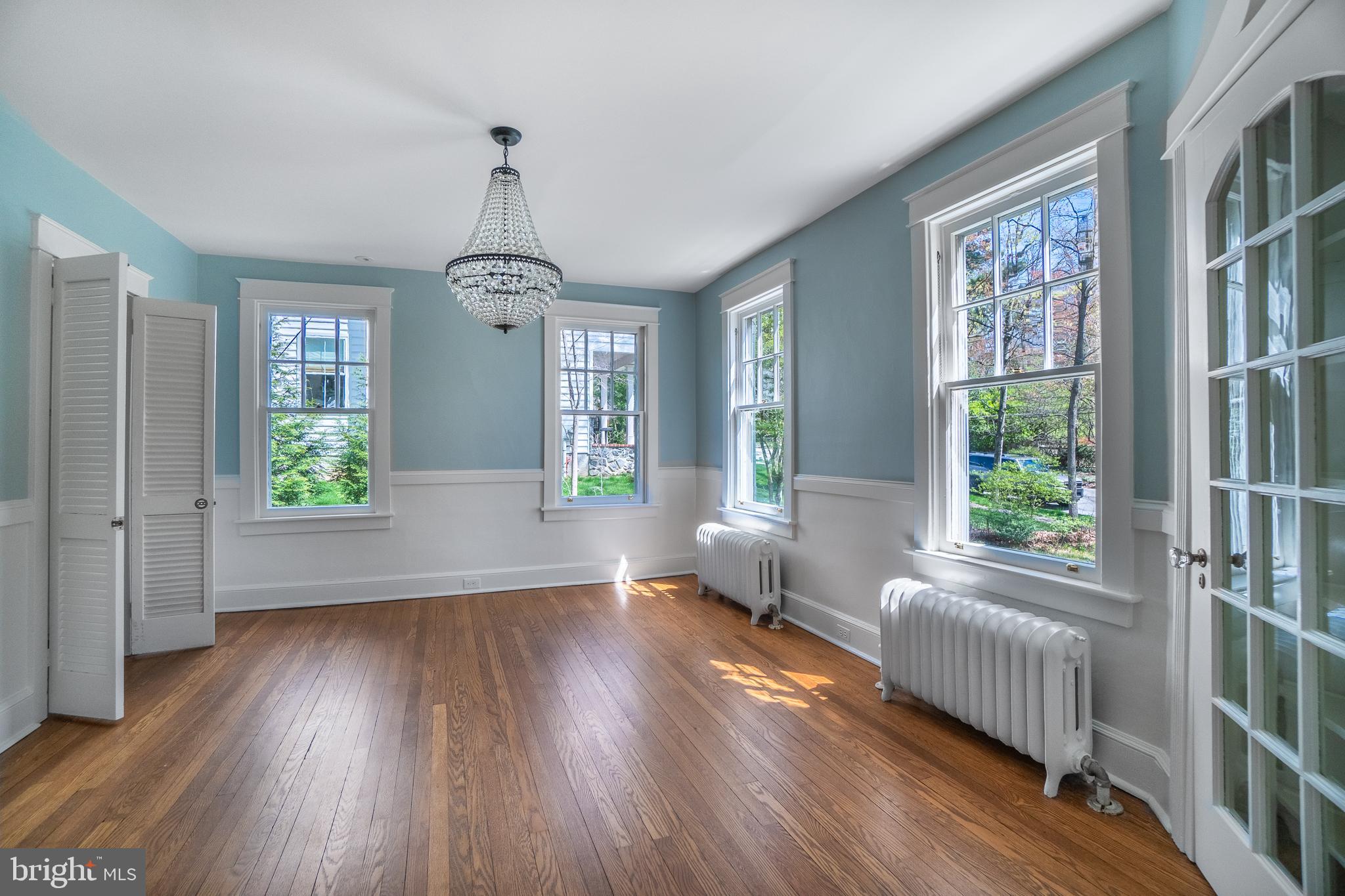 684 North Chester Road Swarthmore, PA 19081 - Photo 9 of 21 a view of an entryway with wooden floor windows and a livingroom