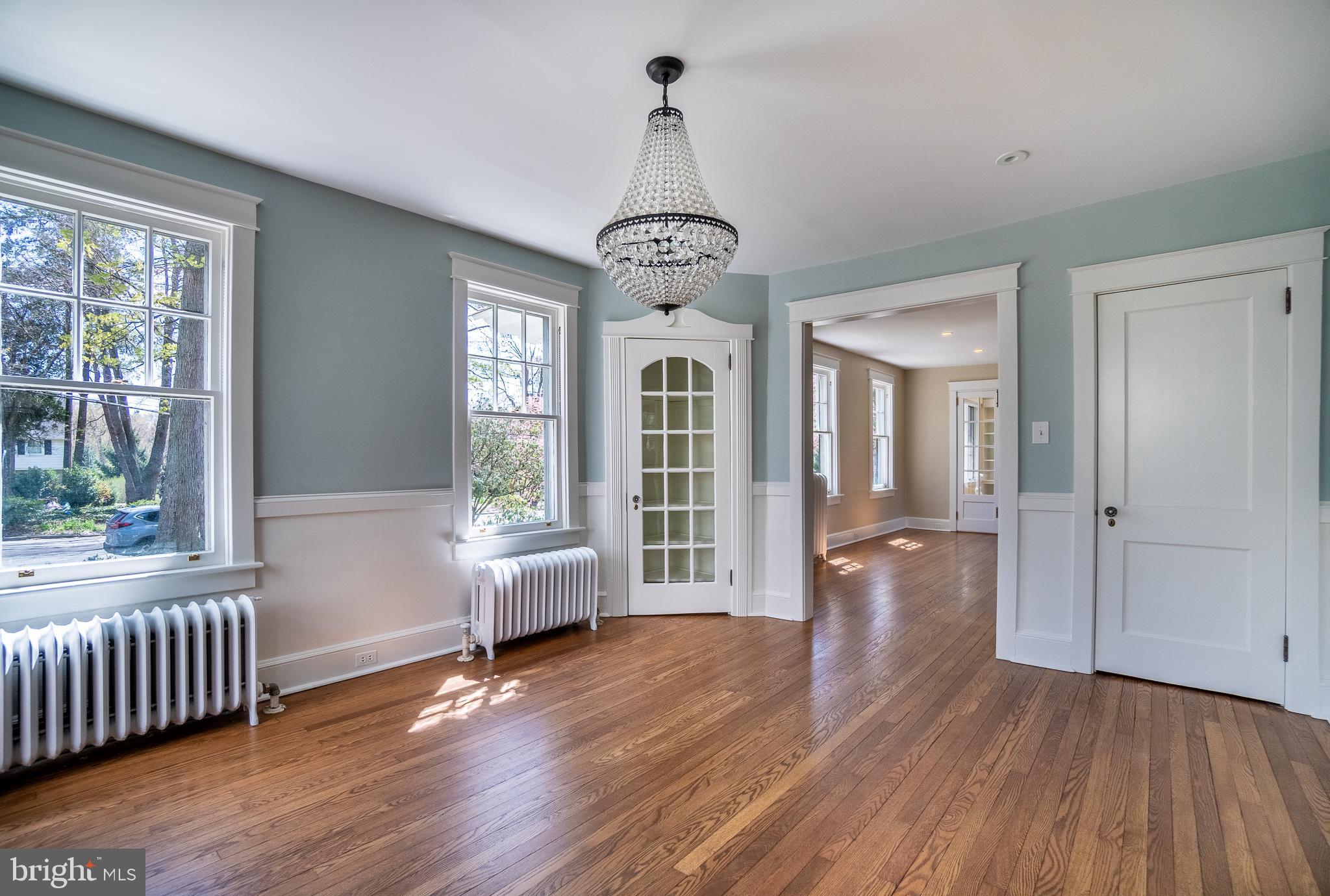 684 North Chester Road Swarthmore, PA 19081 - Photo 10 of 21 a view of a big room with wooden floor windows and windows