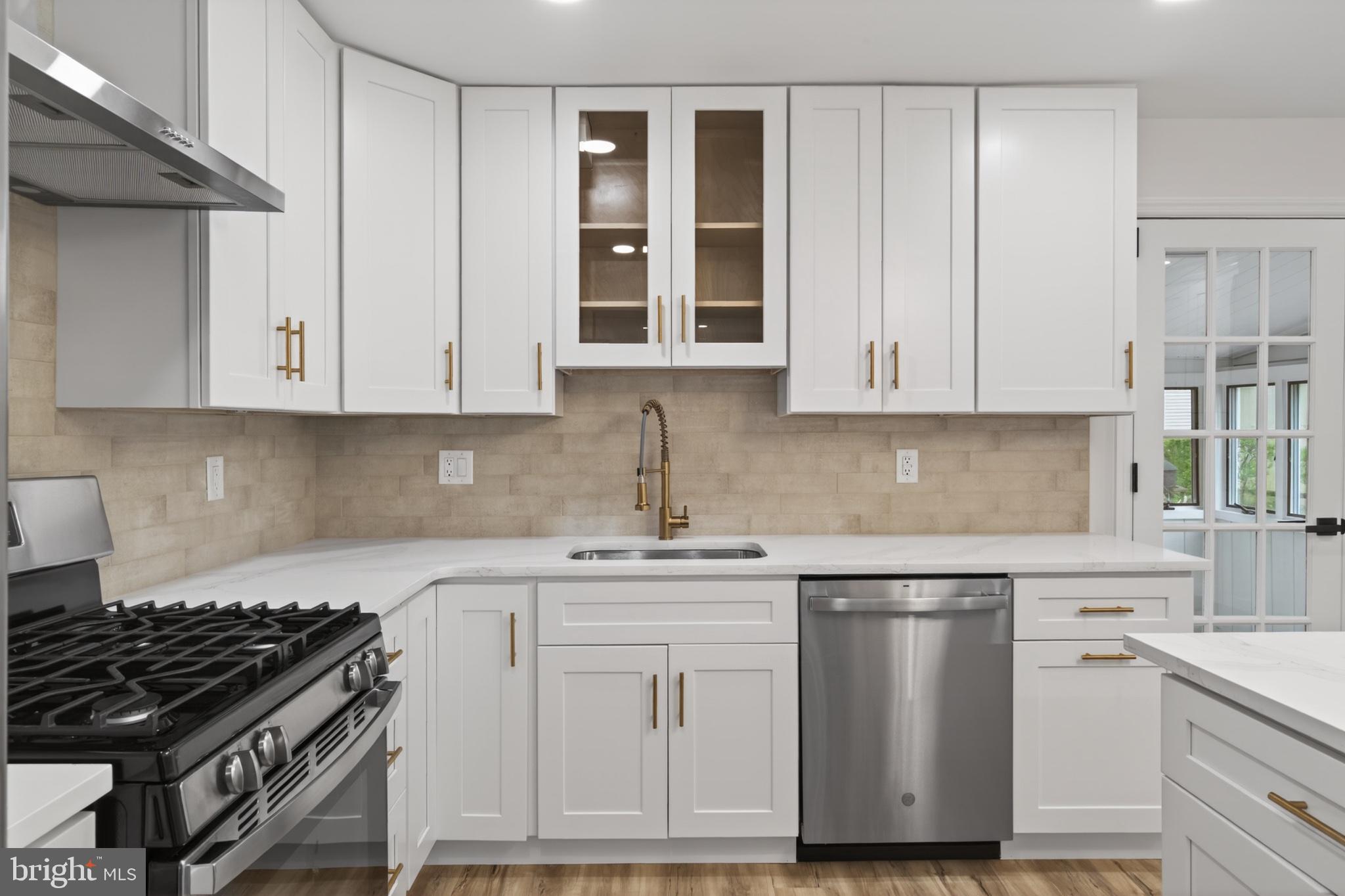 501 Hemlock Road Flourtown, PA 19031 - Photo 3 of 47 Sleek modern kitchen with elegant finishes.