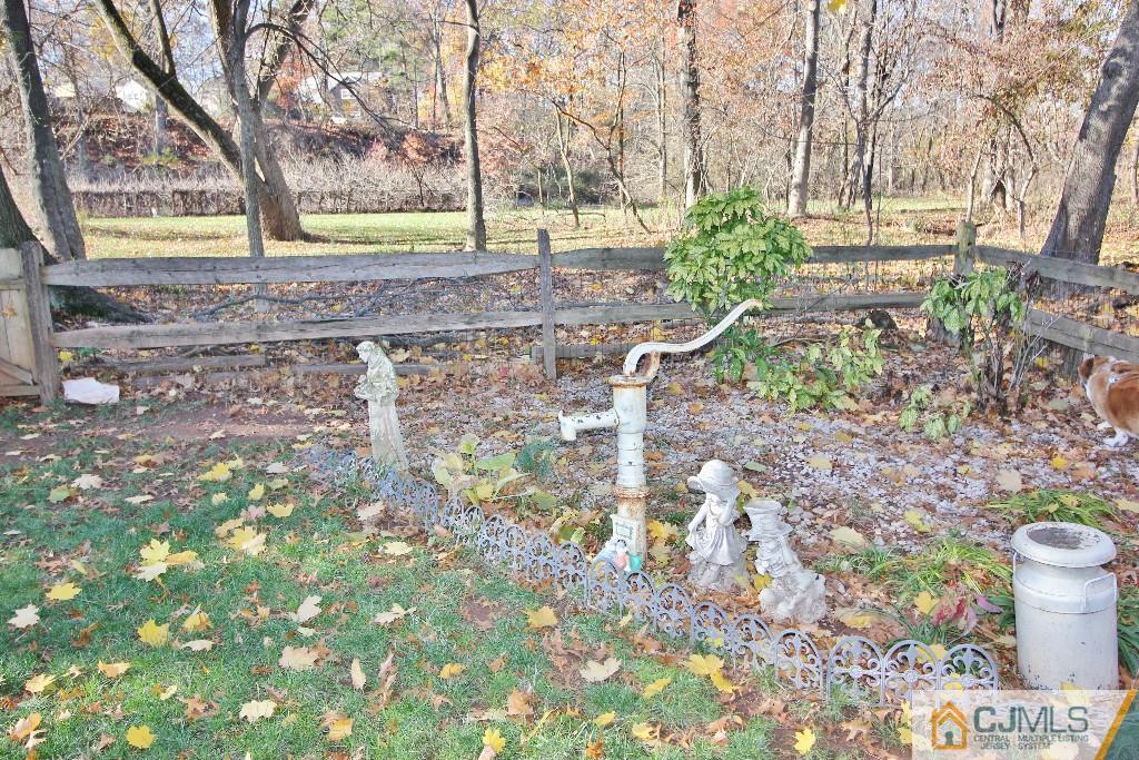 197 North Hill Road Colonia, NJ 07067 - Photo 8 of 25 a view of a yard with plants and trees
