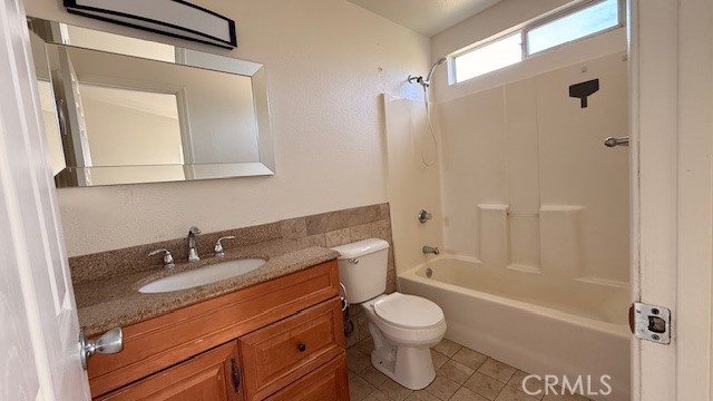 518 5th Santa Maria, CA 93458 - Photo 11 of 24 a bathroom with a granite countertop sink toilet and shower
