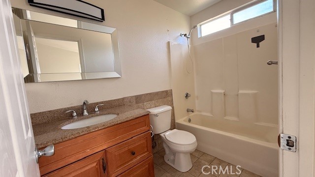 518 5th Santa Maria, CA 93458 - Photo 14 of 24 a bathroom with a granite countertop sink toilet and shower