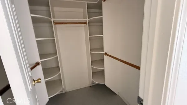 a view of an empty walk in closet